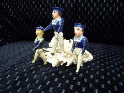 Three hand-carved polychromed Victorian sailors