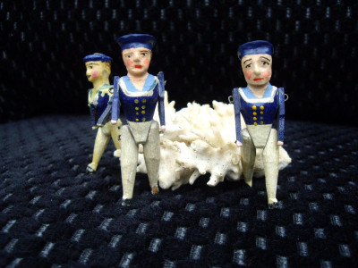 Three hand-carved polychromed Victorian sailors